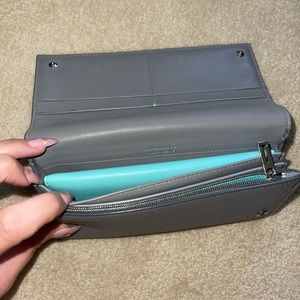 Used grey Tiffany and co traveler wallet with card holder